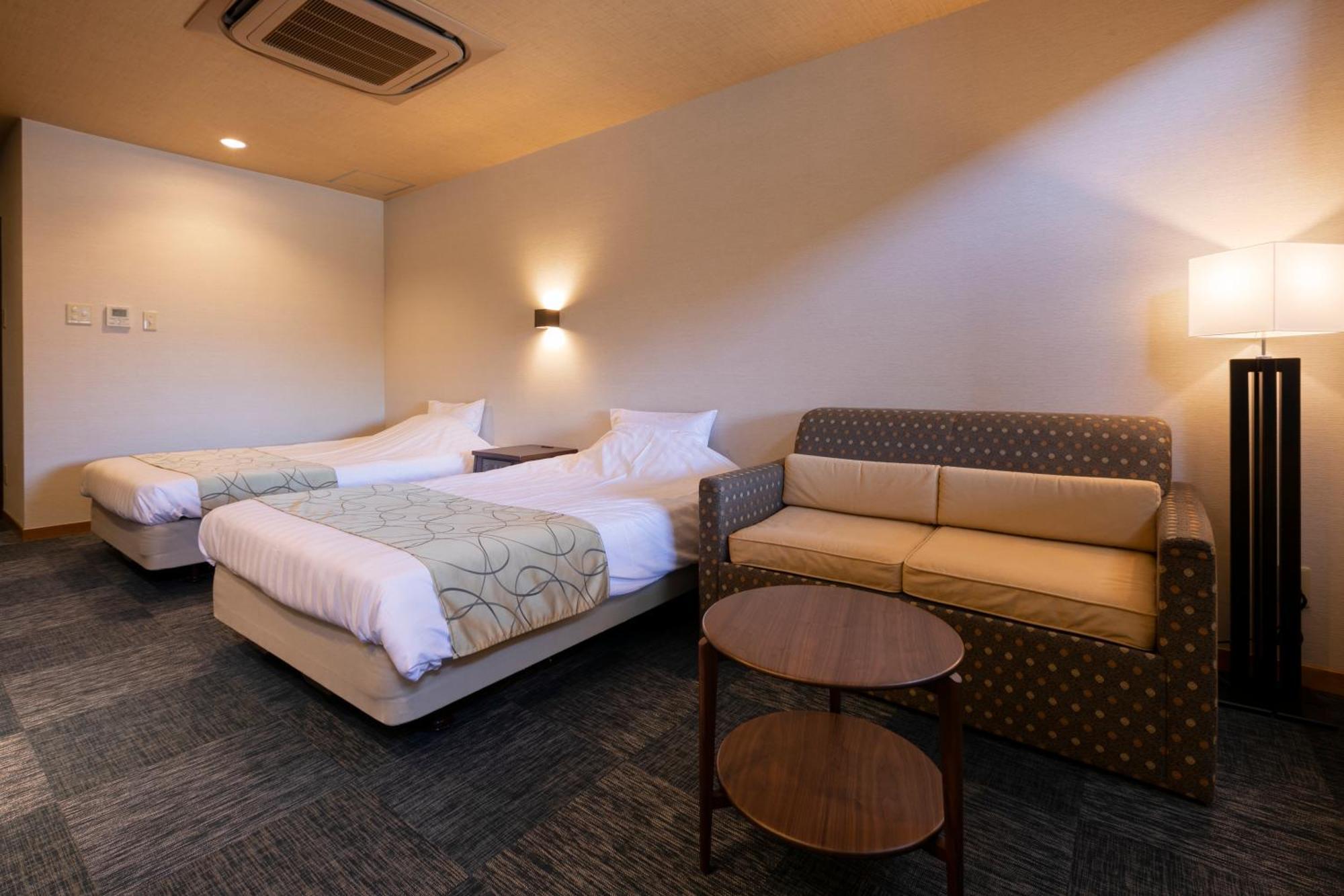 Hotel Yumeshizuku Minamiaso Bagian luar foto